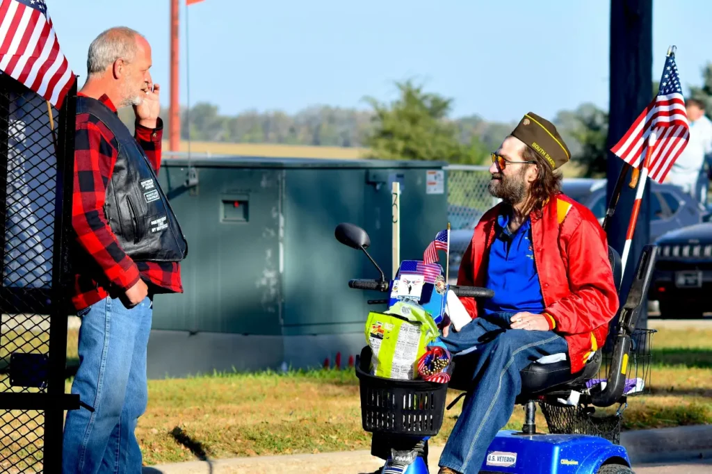 Non Emergency Medical Transportation driver picking up veteran patient for medical visit”